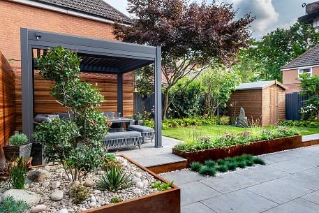 Landscaped garden with patio, planting and outdoor living space