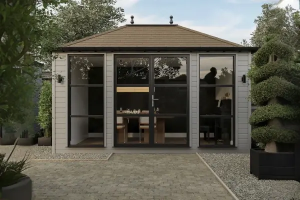 Traditional timber garden room featuring classic hipped roofline and Georgian-style glazing
